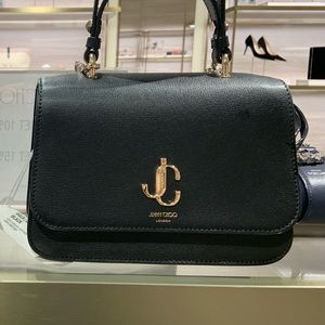 JC top shoulder/crossbody bag is brand new with tags with authenticity card